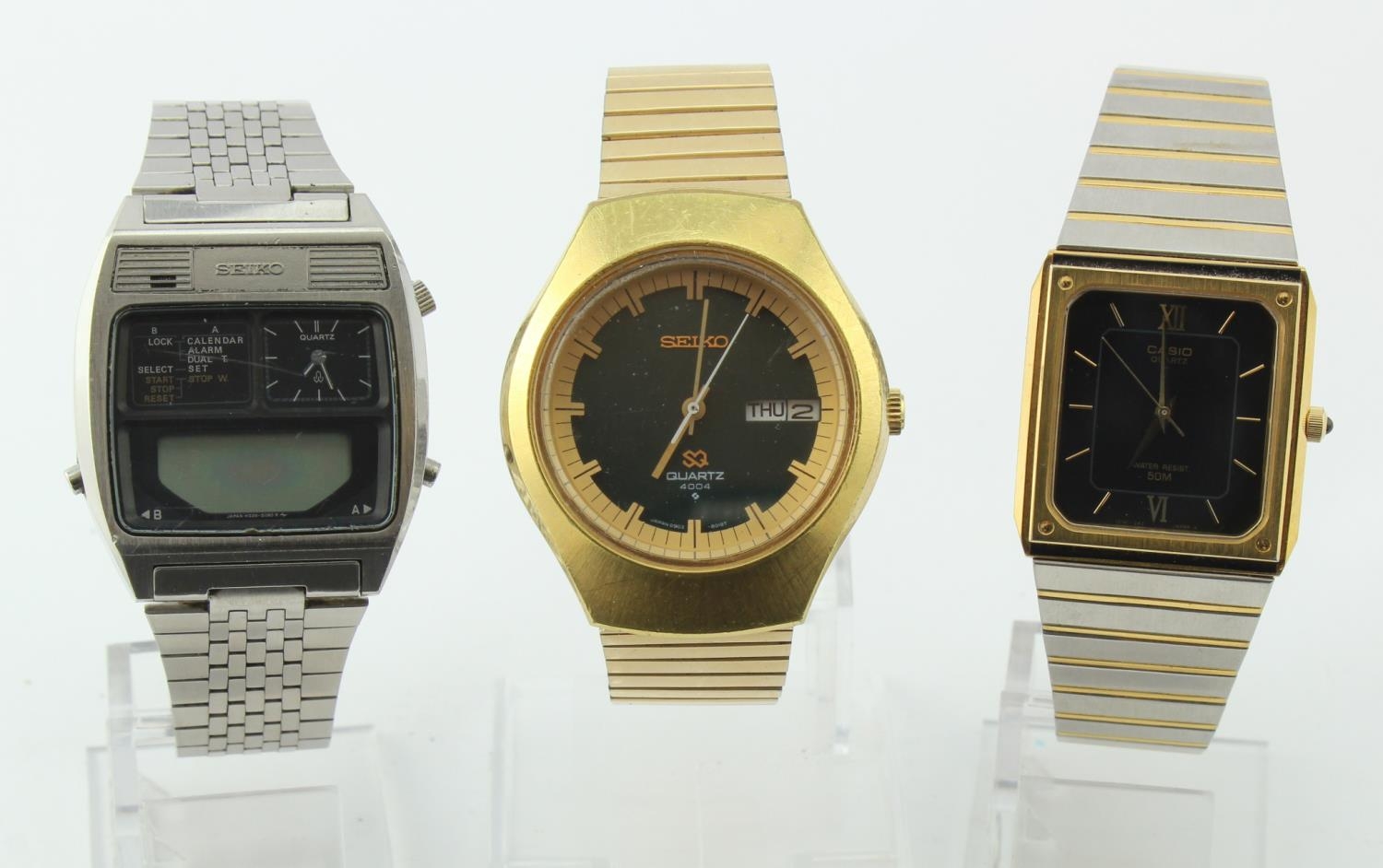 Three gents Seiko quartz wristwatches SQ 4004 working when catalogued,  bi-colour dress watch working