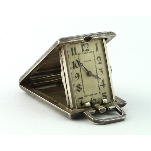 738 - Silver cased travel clock by eszeha, case stamped '935', size 43mm x 32mm approx. (working at time o... 