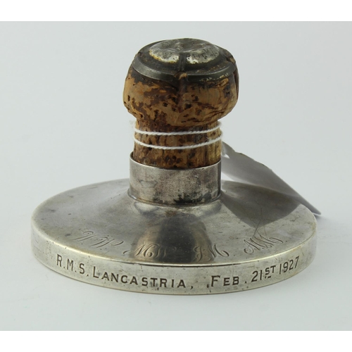 814 - RMS Lancastria interest. A bottle cork mounted in a sterling silver base, edge reads 'R.M.S. Lancast... 