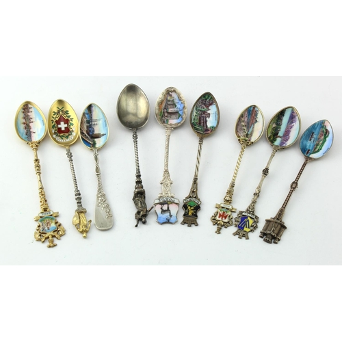 836 - Silver enamel spoons. A group of nine mostly continental silver & enamel souvenir teaspoons, includi... 