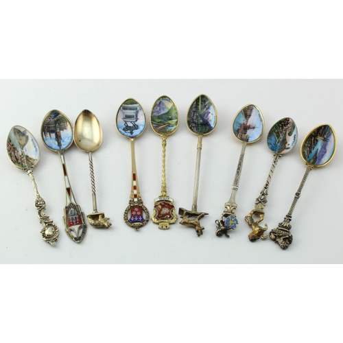 837 - Silver enamel spoons. A group of nine mostly continental silver & enamel souvenir teaspoons, includi... 