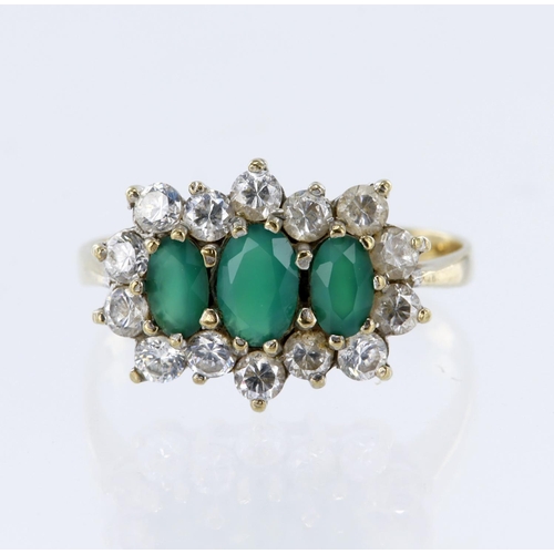 84 - 9ct yellow gold triple cluster ring set with three graduated oval emeralds and surrounded by fourtee... 