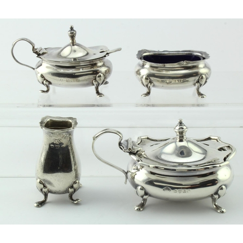 872 - Three piece silver cruet set - mustard, salt & pepper (missing lid),  includes two blue glass liners... 