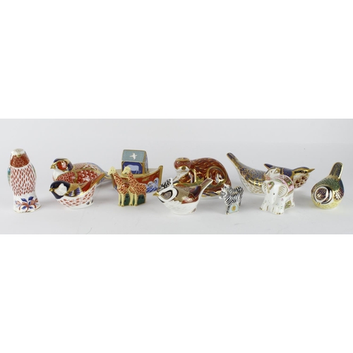 982 - Royal Crown Derby. A collection of ten Royal Crown Derby animal paperweights, including Noahs Ark (w... 