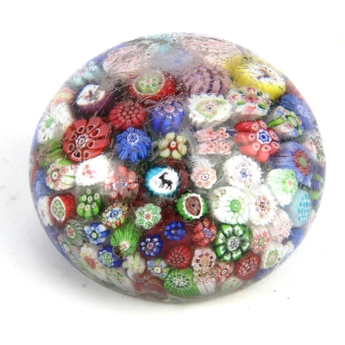 993 - 19th century Baccarat close packed millefiori glass dome paperweight, some canes set with animals  a... 