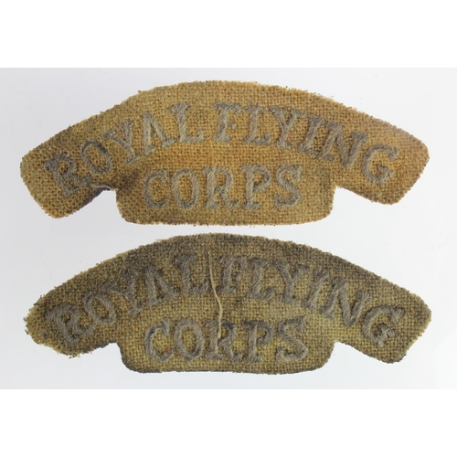1090 - Badges a pair of well used Royal Flying Corps cloth shoulder titles.