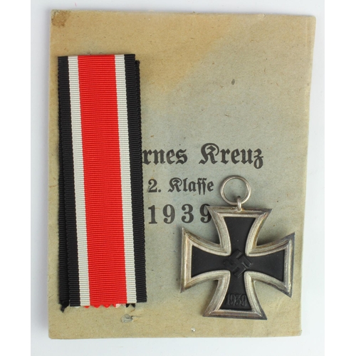 1269 - German Iron Cross 2nd class WW2 in paper packet and with unused ribbon, ring maker stamped.