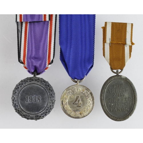 1305 - German medals x3, West Walls Medal, Luftschutz Medal, Army Long Service Medal