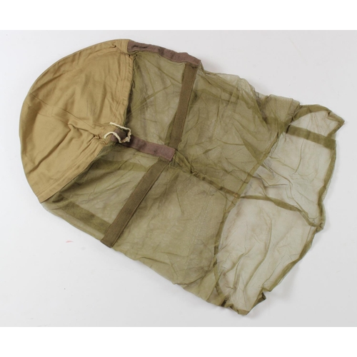 1795 - WW2 scarce 1944 dated mosquito net helmet cover unissued.