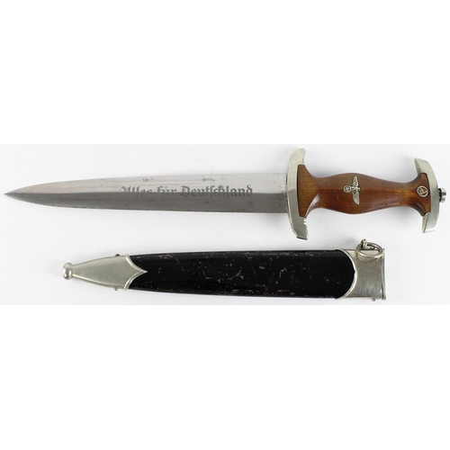 1905 - German Nazi SA Dagger with black scabbard, crossguard stamped 'B'. Blade maker marked 'RZM M7/72'.