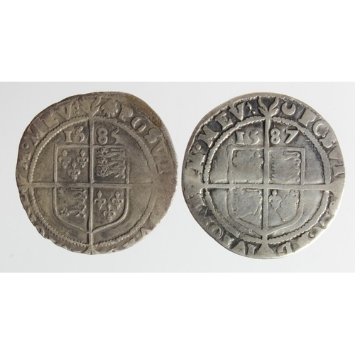 541 - Elizabeth I Sixpences (2): 1585 Escallop VG/F, and 1587 Crescent Fair/Fine.