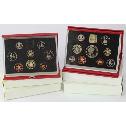 779 - GB Proof Sets (4) deluxe red: 1986 x2, 1999 and 2007, aFDC-FDC cased with certs and packaging.