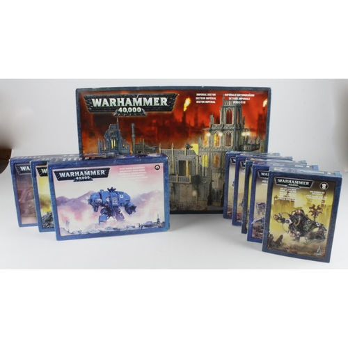 120 - Warhammer 40k. A collection of nine boxed Warhammer 40k sets, including Imperial Sector, Space Marin... 