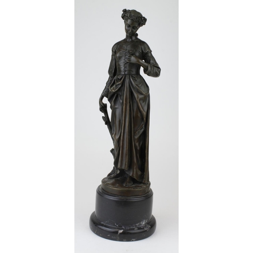 261 - Bronze figure of a woman standing. On a marble base. Signed Zegut/Tusey. Height measures approx 34.5... 