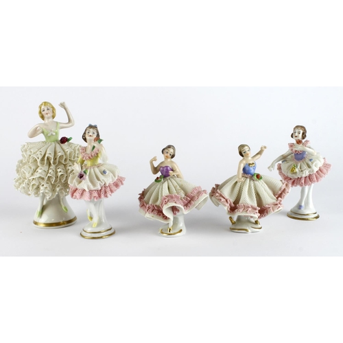 275 - Figures. Five Continental porcelain figures, circa 19th Century, each with flowers, various makers m... 