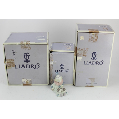 277 - Lladro. A group of three boxed Lladro figures, comprising 'At the Ball', 'Pierrot with Puppy' & 'Pie... 