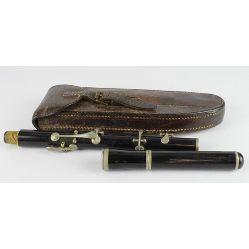 304 - Henry Potter two piece piccolo, length 39cm approx., in a contemporary leather case