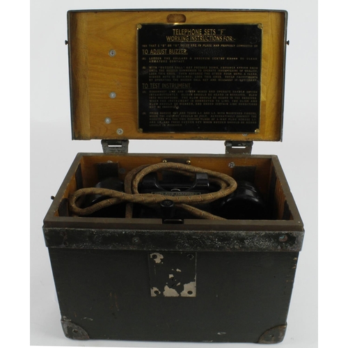 362 - Two WWII era field telephones (Set F), both contained in original wooden boxes, with instructions to... 