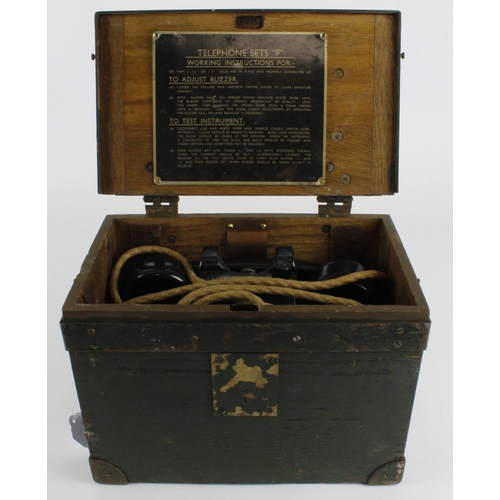 362 - Two WWII era field telephones (Set F), both contained in original wooden boxes, with instructions to... 