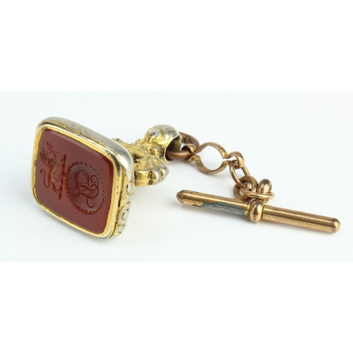 365 - Victorian gold plated cornelian seal engraved with initials plus an armorial showing a lion holding ... 