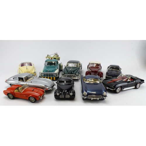 73 - Model Cars. Ten Large scale diecast model cars & trucks, makers include Ertl, Welly, Burago, etc.