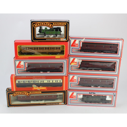 81 - OO gauge. A collection of boxed OO gauge model railway, comprising Lima locomotive '4594' & seven co... 