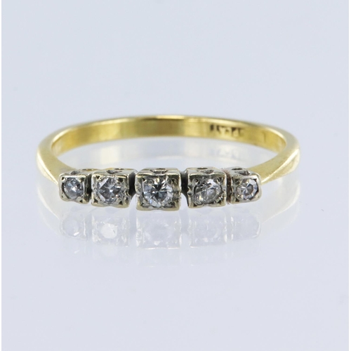 106 - Yellow gold (tests 18ct) diamond five stone ring, set with graduating  round cut diamonds total weig... 