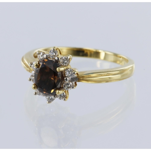 24 - 18ct yellow gold diamond cluster ring, principle oval brilliant cut fancy cognac diamond originating... 