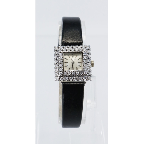 333 - Ladies white gold (tests 18ct) cased Longines manual wind wristwatch, square cream dial with batons,... 