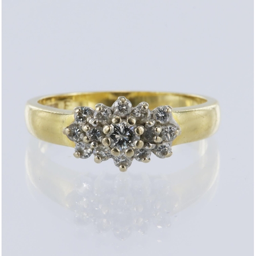 36 - 18ct yellow gold diamond cluster ring, principle round briliant cut diamond 0.15ct, surrounded eight... 