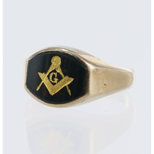 39 - Yellow gold (tests 9ct) signet ring, masonic gold inlay set in to bloodstone table, bloodstone measu... 
