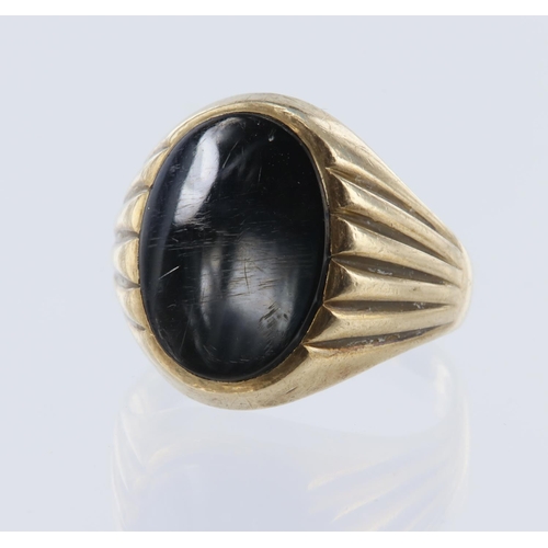 46 - Yellow gold (tests 9ct) signet ring set with a oval shaped onyx measuring 15.8mm x 11.7mm, finger si... 