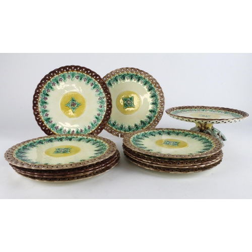 664 - Wedgwood. Ten Wedgwood, majolica plates, diameter 23cm approx., together with a matching cake stand,... 