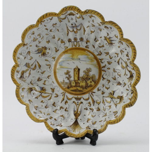 665 - Willem Jansz Verstraeten (c. 1590s � 1655). A Dutch ribbed maiolica white & yellow dish, with centra... 