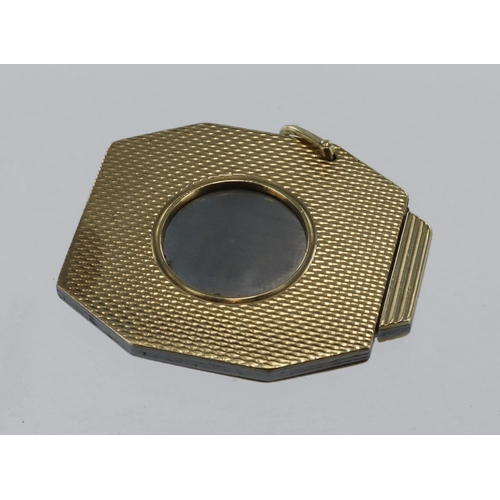 666 - 9ct yellow gold cigar cutter with engine turn work, weight 17.5g.