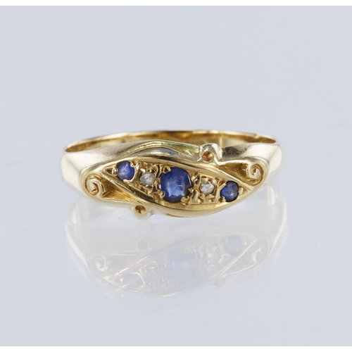 71 - 18ct yellow gold diamond and sapphire boat shaped ring, set with three graduated round sapphires and... 