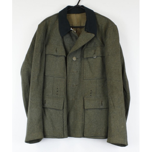 313 - KM M43 Coastal Artillery Jacket. Dated 1944. Insignia removed.