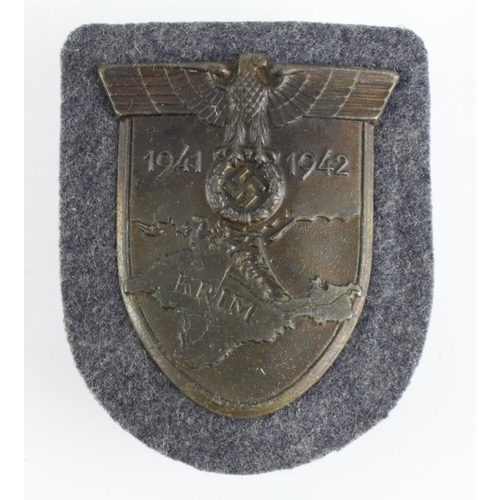 329 - Krim Arm Shield 1941-1942 on Luftwaffe blue cloth backing