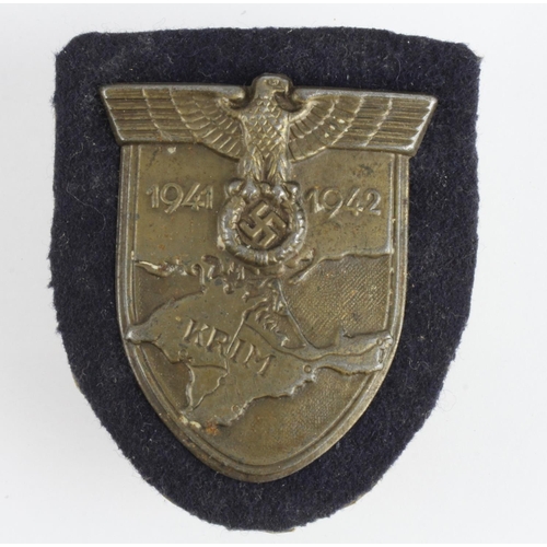 331 - Krim Arm Shield 1941-1942 on Navy / Panzer cloth backing