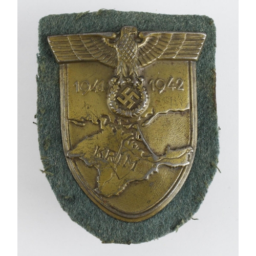 332 - Krim Arm Shield 1941-1942 on police green cloth backing