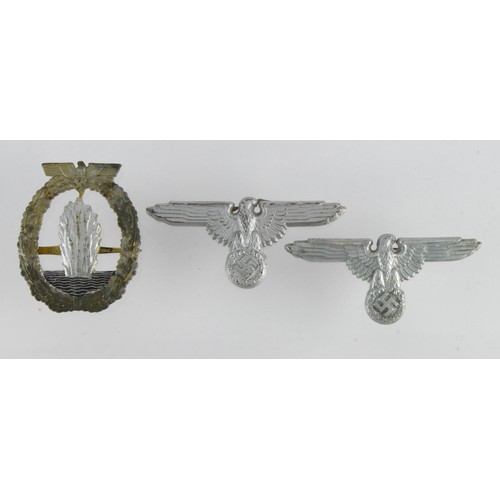 79 - German Nazi aluminium cap eagles, one marker marked 'SS 475/43', and the other marked 'SS 373/43'. W... 