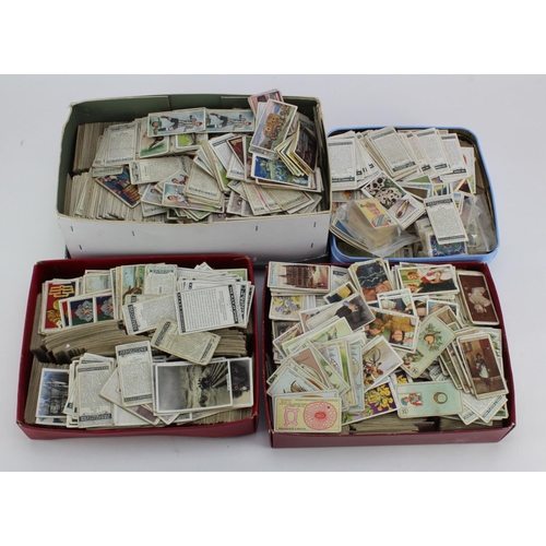 1230 - Blue plastic crate with a large qty of loose Cigarette cards in tins, boxes, all loose. (Buyer colle... 