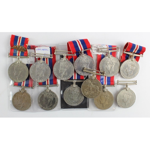 1628 - WWII War Medals (x12), 2 named to Indians, 1 with Oak Leaf, some ribbons