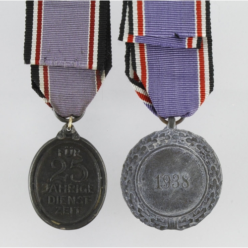 1737 - German Luftscutz Civil Defence medal and 25 Year Fire Service Medal.