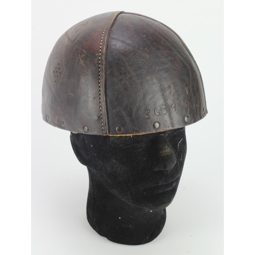 2073 - British Hard protective helmet in leather 1941 dated, either Dispatch or early Para type, scarce.