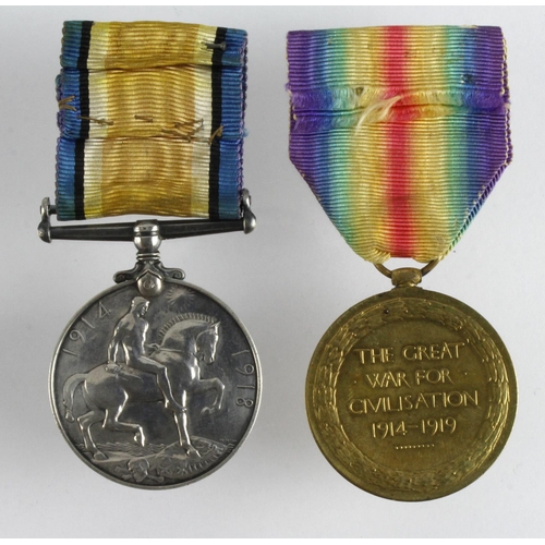 2097 - BWM & Victory Medal named (F.2432 E N Ashfield ACT.A.M.1.RNAS). Missing a 1915 Star. (2)