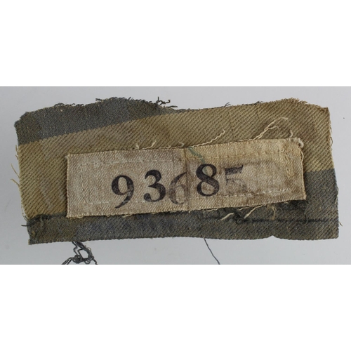 2235 - Holocaust interest a piece of striped uniform with number 