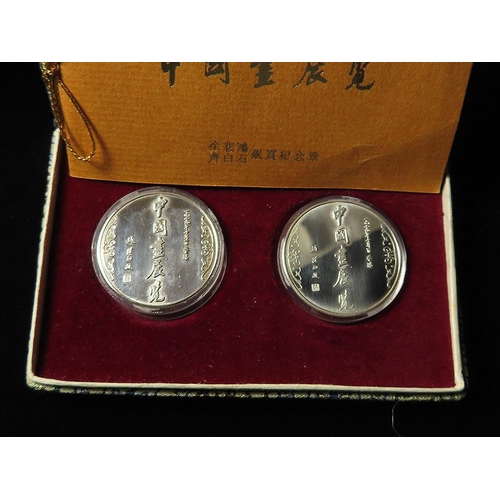 769 - Hong Kong commemorative medals (2) silver d.30mm: A cased pair of silver medals commemorating the gr... 