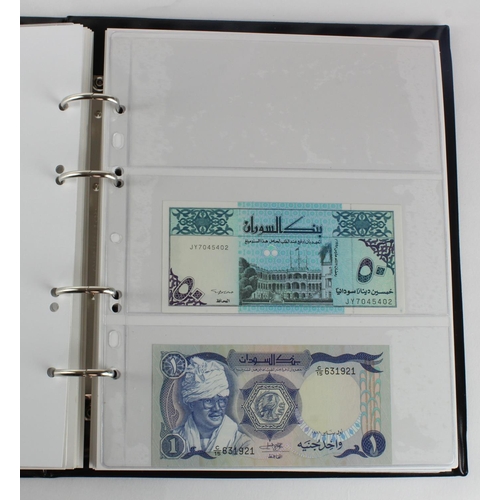 1062 - World, Africa G - U (99) a good group of mostly Uncirculated notes in 2 x Collectors albums, Gambia,... 