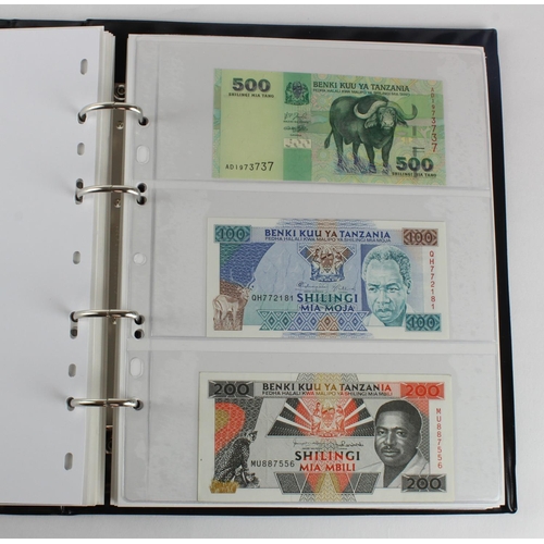 1062 - World, Africa G - U (99) a good group of mostly Uncirculated notes in 2 x Collectors albums, Gambia,... 